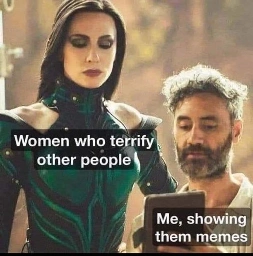 dark foreboding woman looking over Lil guy with a clipboard meme.  the woman is labeled Women who terrify other people. Lil guy labeled as Me showing them Memes