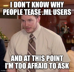 Image shows Andy from "Parks and Recreation" with a caption that reads: I don't know why people tease .ml users and at this point I'm too afraid to ask.