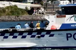 Me, standing in a police boat wearing a life jacket that says "No New Coal" hard to see but I'm joined by a student doctor, she's a true inspiration.