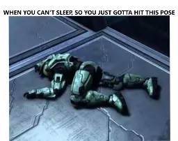 master chief laying on the floor in a funny position