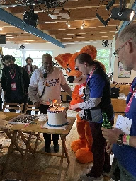 Foxie cutting their 20 yo birthday cake