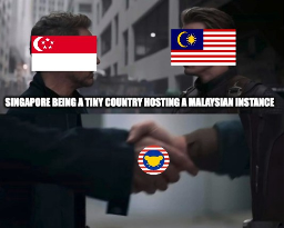 Ironman "Singapore" shakes hand of Captain America "Malayasia" "Singapore being a tiny country hosting a Malaysian instance" forming "monyet.cc"